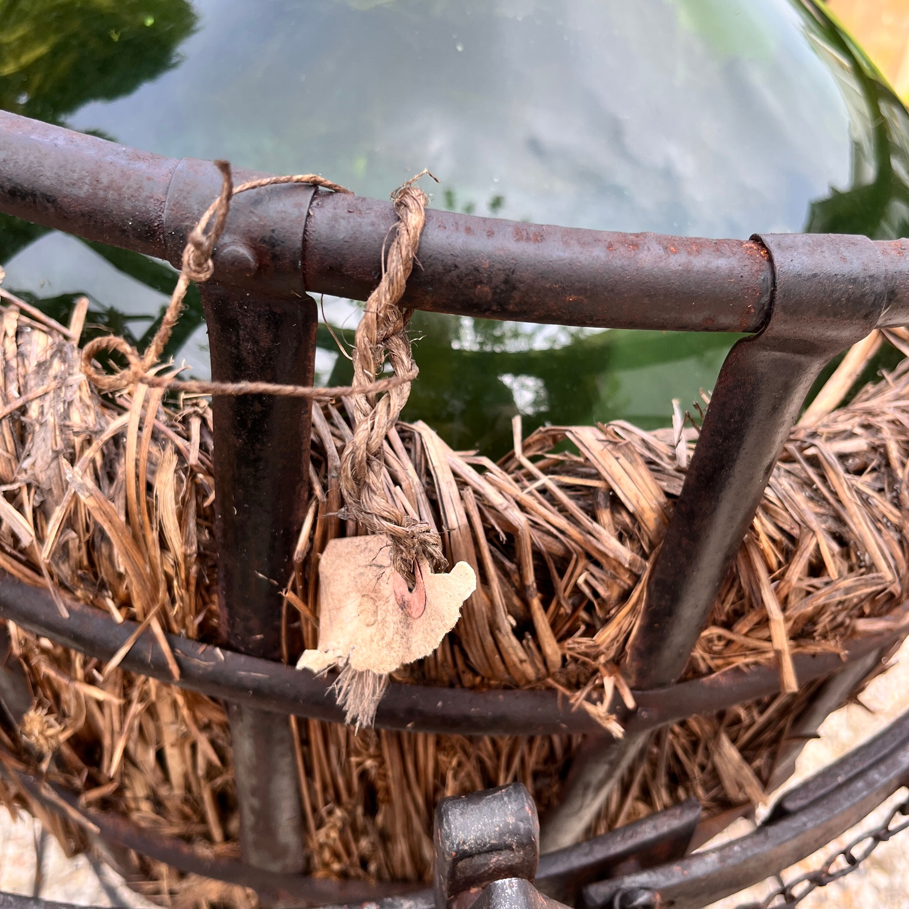 Demijohn on steel rocker
