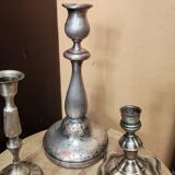 Set of three silver candle holders