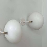Pair of vintage adjustable wall lights, brass and white metal, France 1970