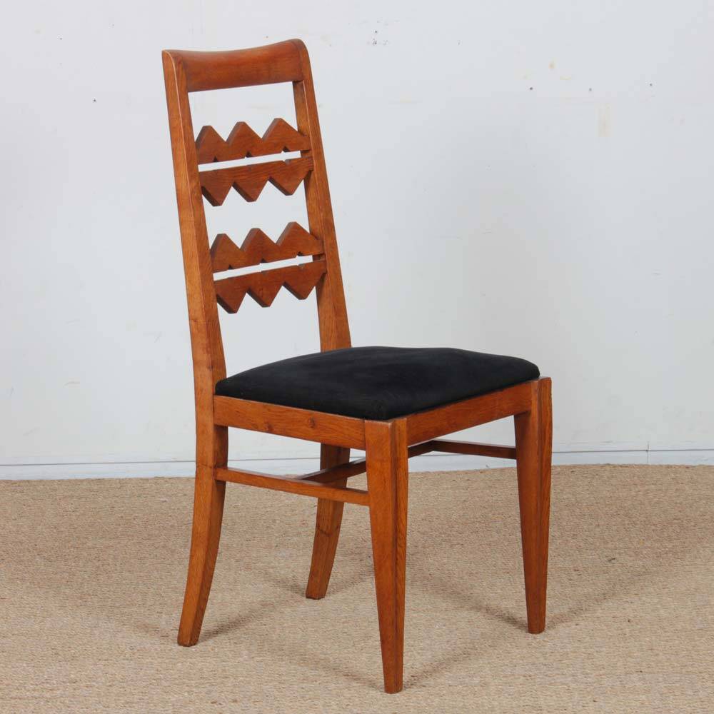 Set of 4 solid oak chairs from the 1950s.