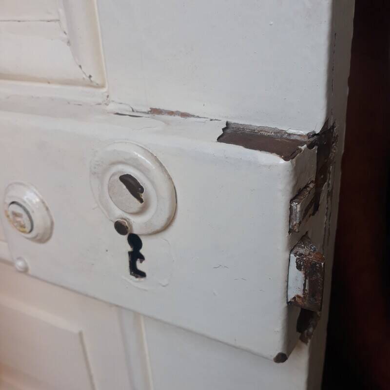 Communication door H220xW80.5cm, old panelled with moulding.