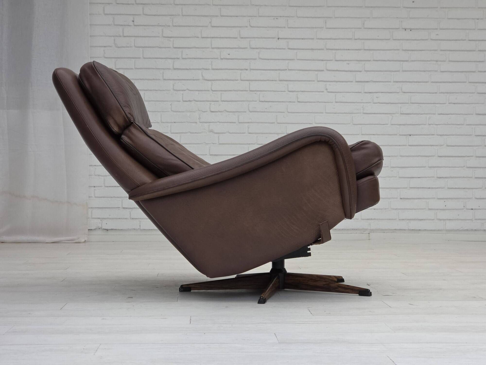 1970s, Danish swivel armchair with footstool by Madsen & Schubel.