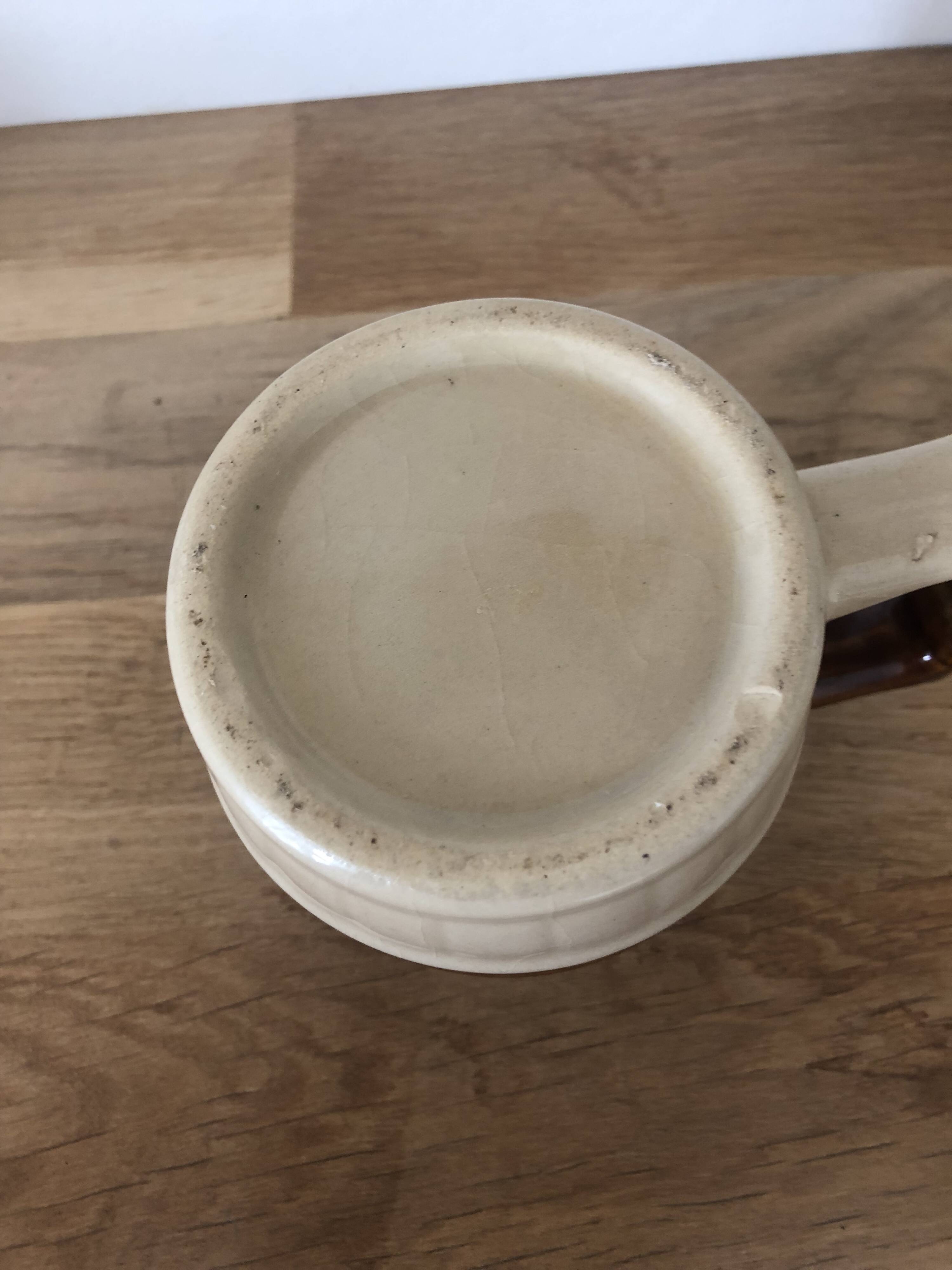 Vintage small brown mug