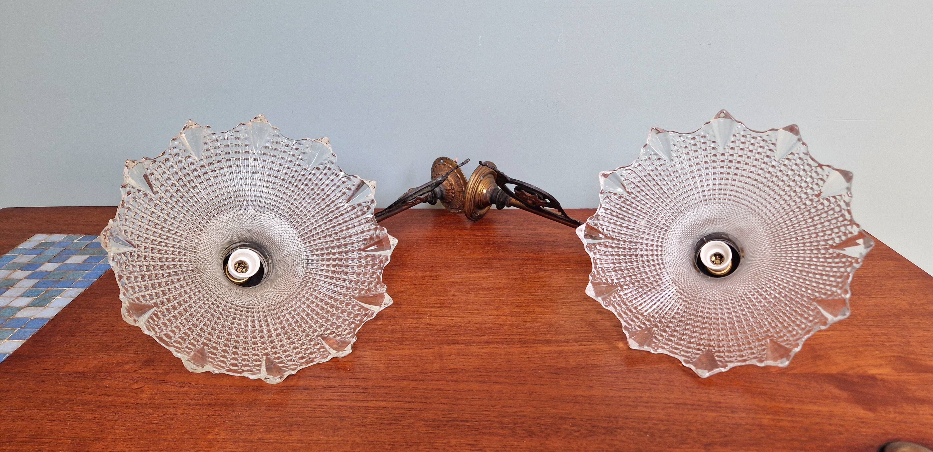 Pair of pendant lights in bronze and scalloped transparent glass
