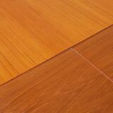 Expandable teak dining table