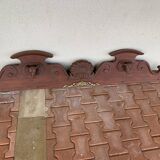 Log frontispiece with ox heads