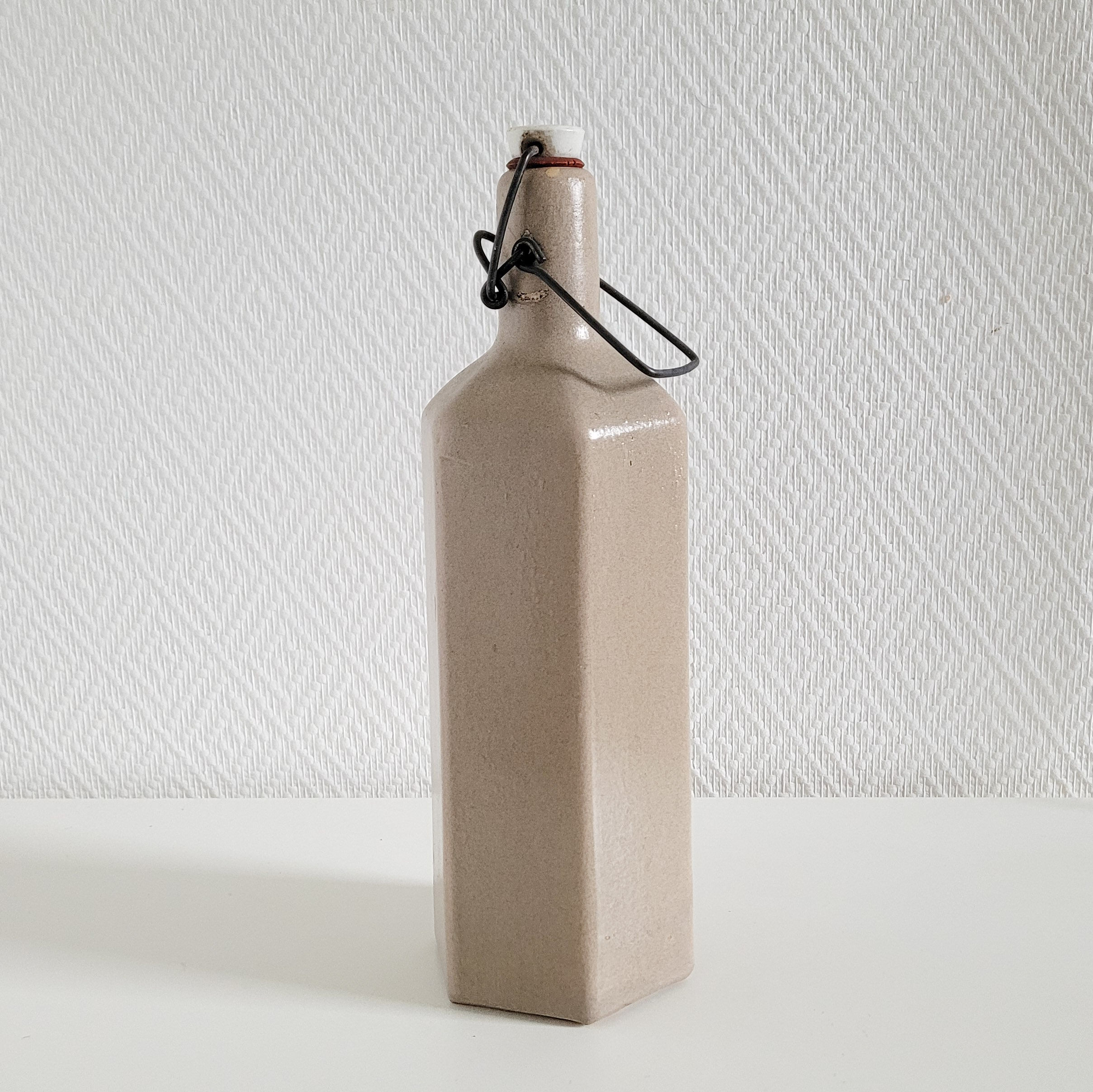 Old hexagonal sandstone bottles