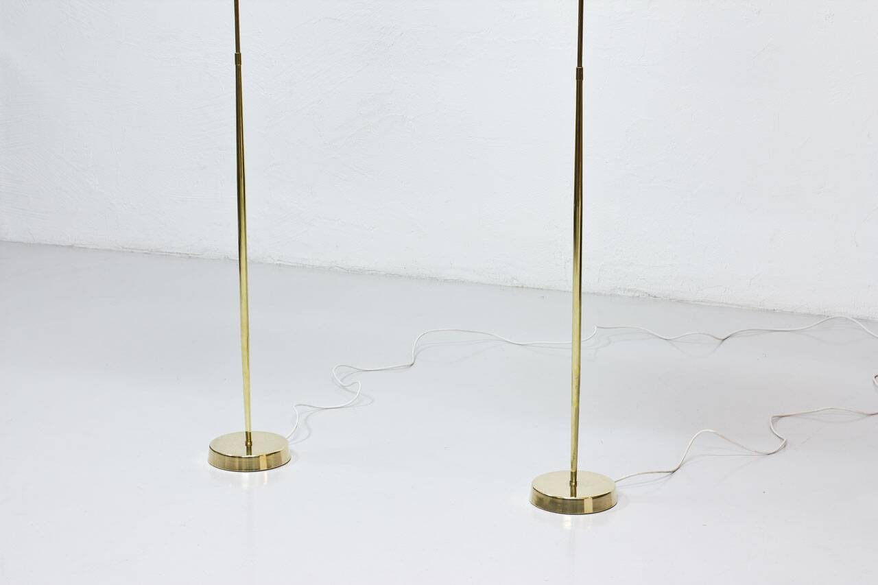 Pair of brass floor lamps by ASEA Belysning, Sweden, 1950s