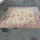 Persian rug in burgundy yellow wool, 200x300cm