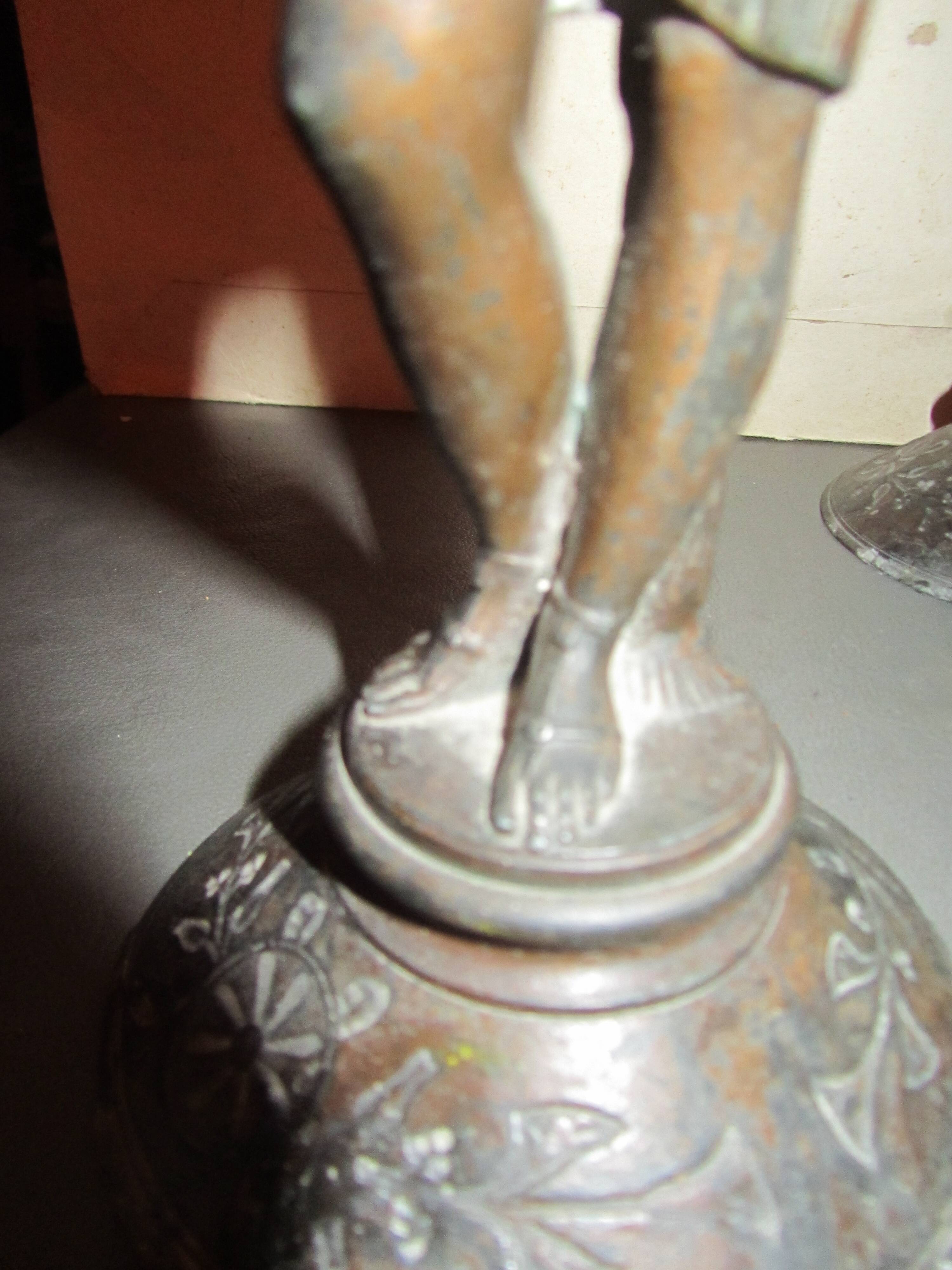 Pair of antique Egyptian-style spelter torches.