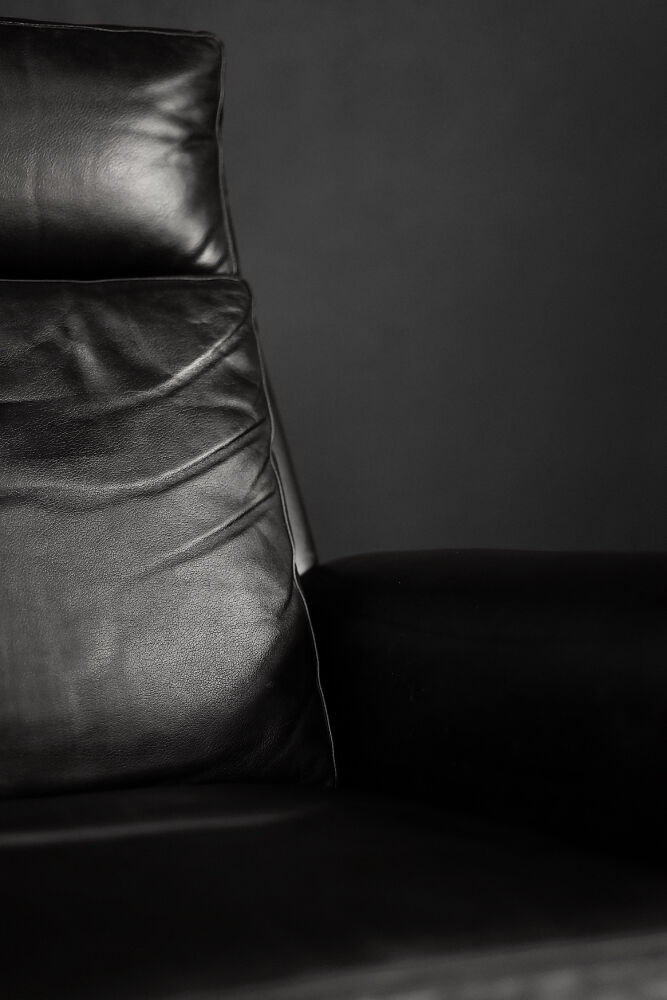 Mid-century danish modern minimalist black leather swivel armchair by georg thams, 1960s