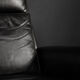Mid-century Danish black leather swivel chair by Georg Thams, 1960s.