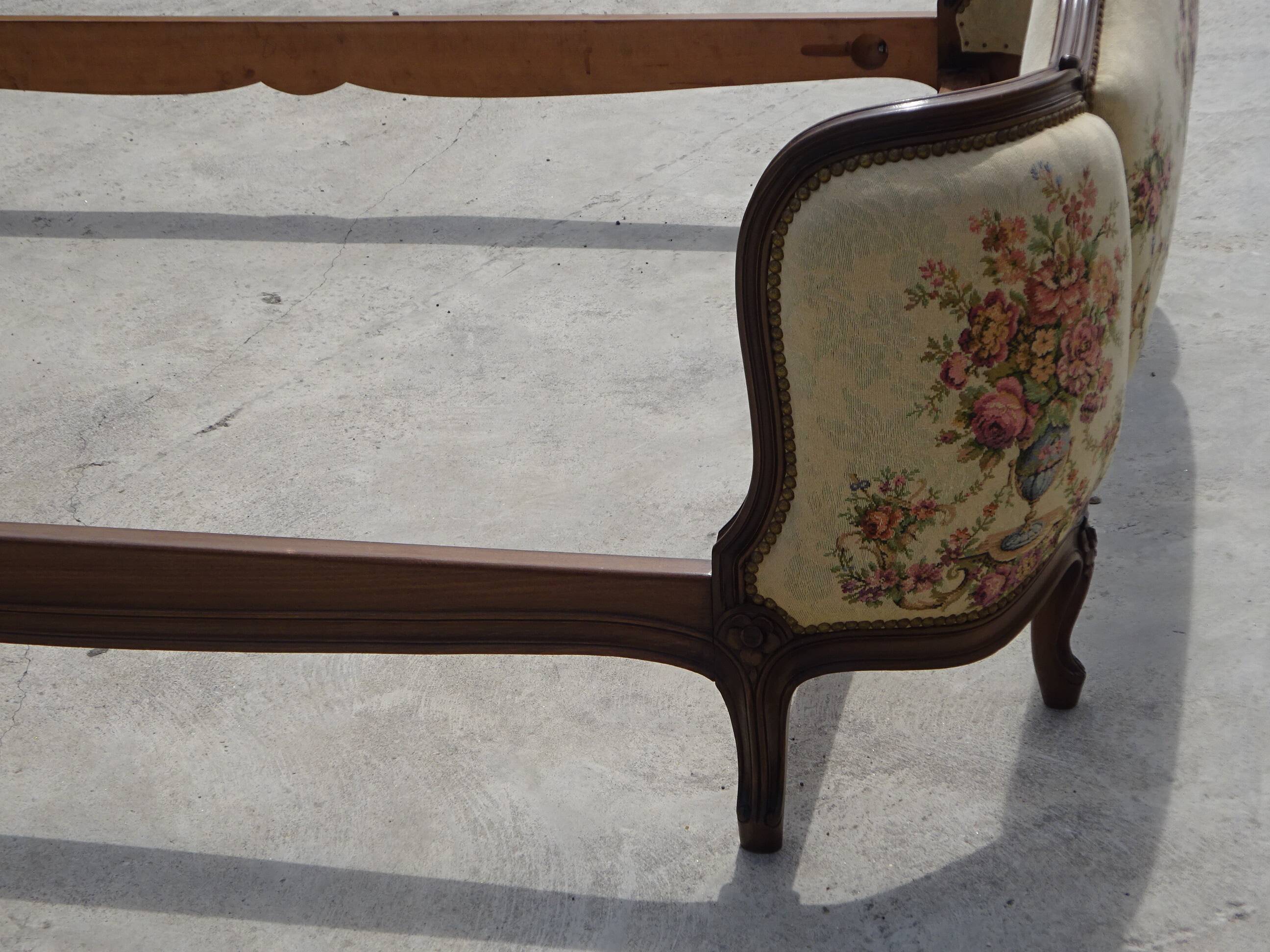 Solid wood bed frame with Jacquard fabric.
