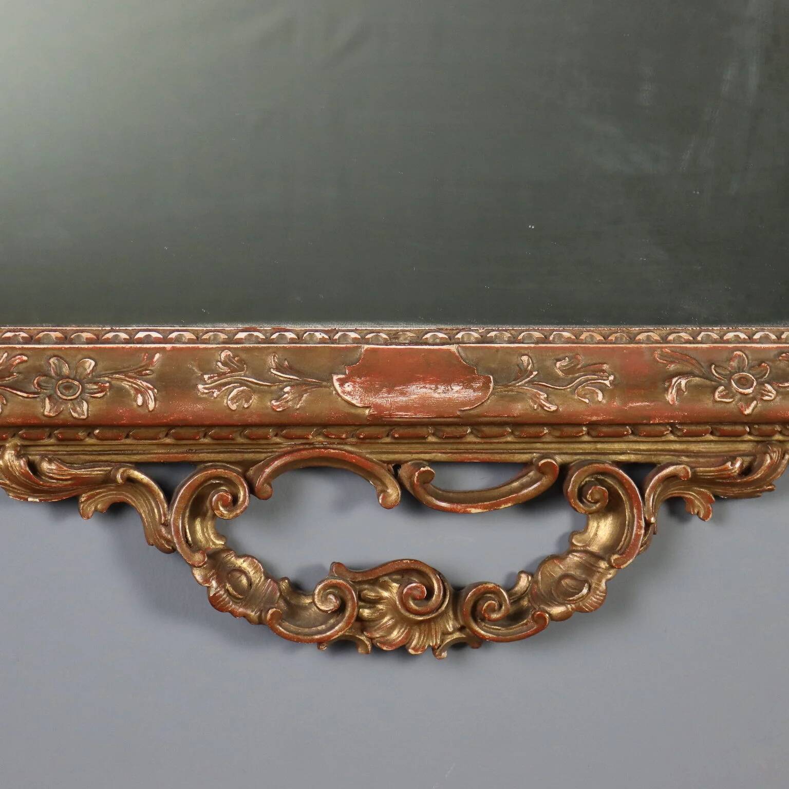 Antique carved and gilded wooden mirror, Italy, early 20th century.