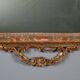 Antique carved and gilded wooden mirror, Italy, early 20th century.
