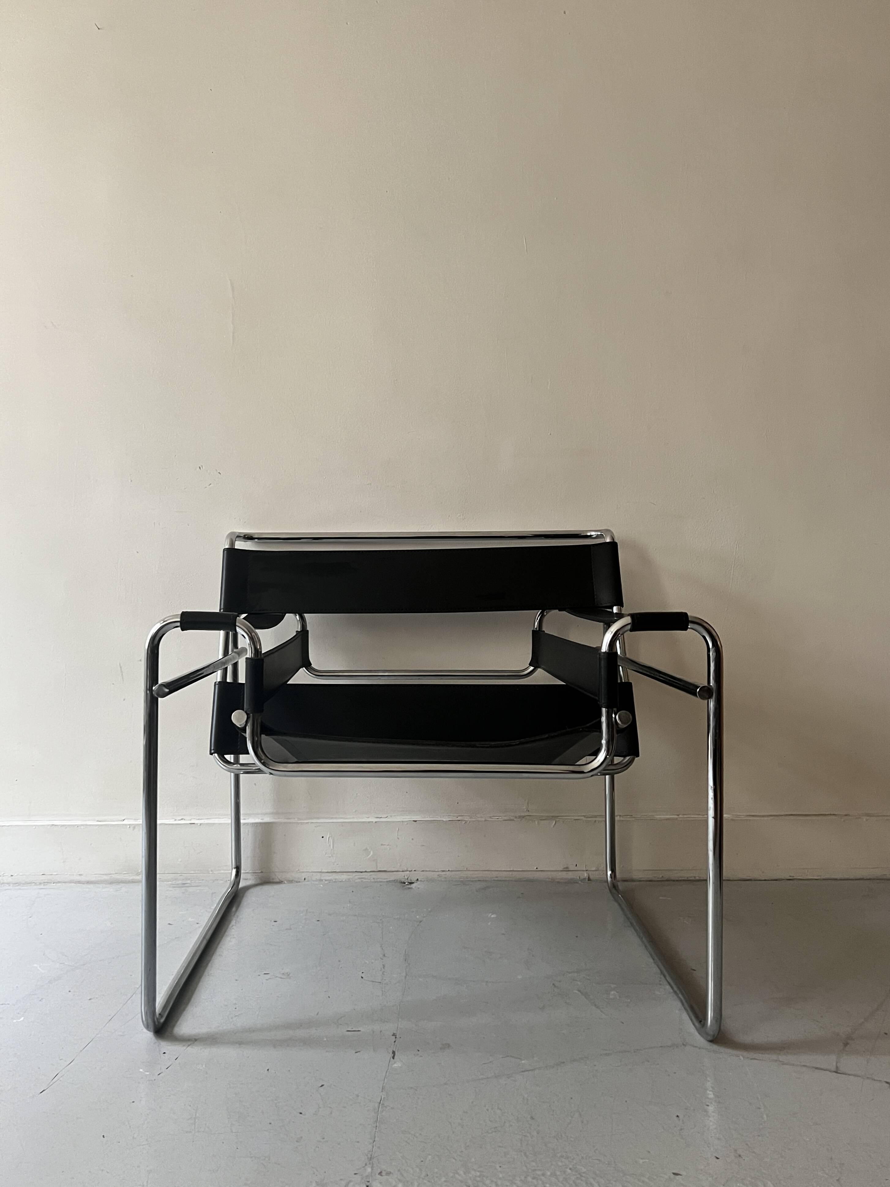 Wassily tubular armchair in chrome & black leather, designed by Marcel Breuer in 1970.