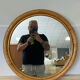 Round rattan mirror