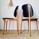 Paire de chaises vintage 1960 – Pieds compas & Simili-cuir noir