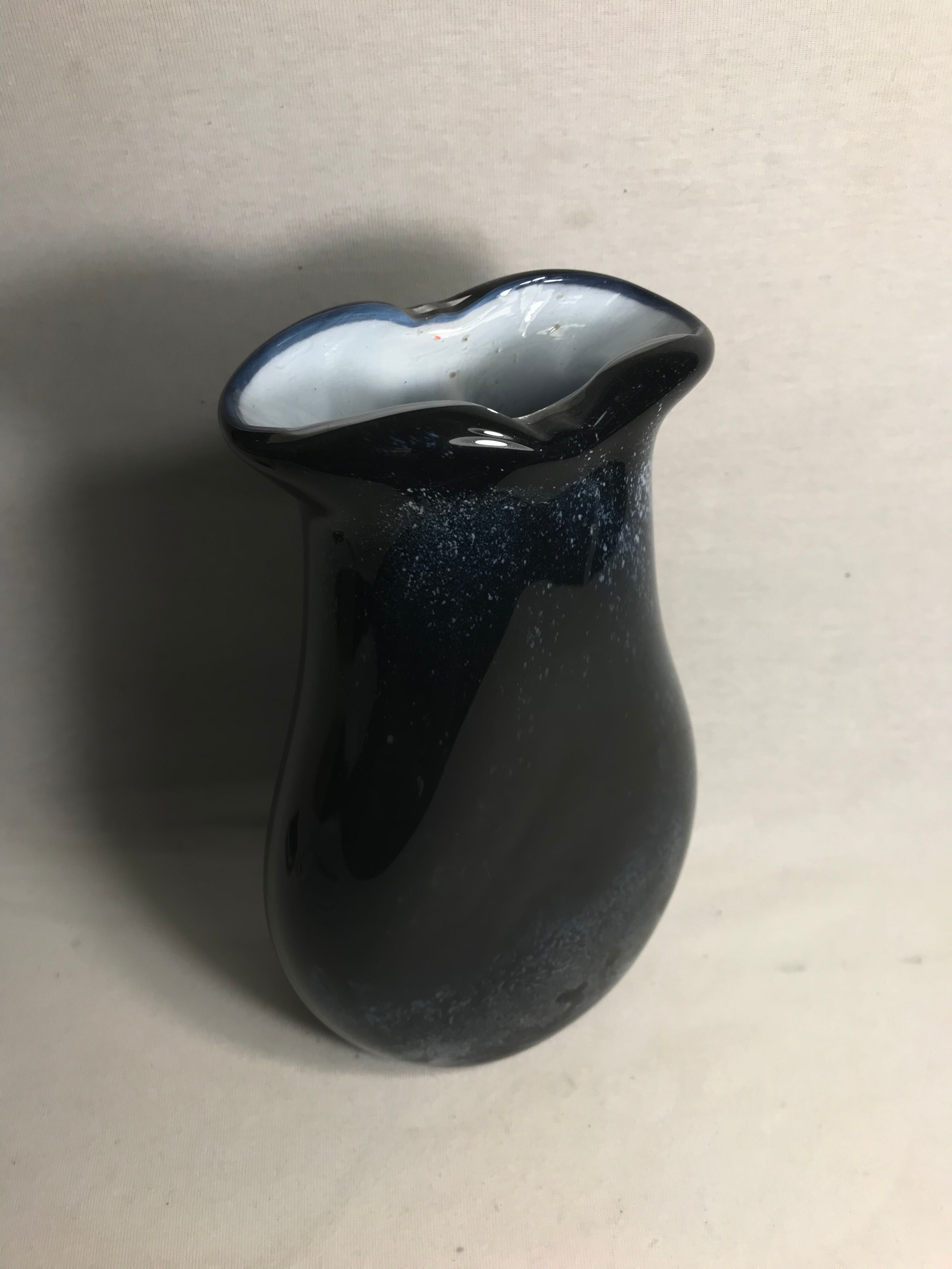 Old glass vase multilayer blue, white vintage interior