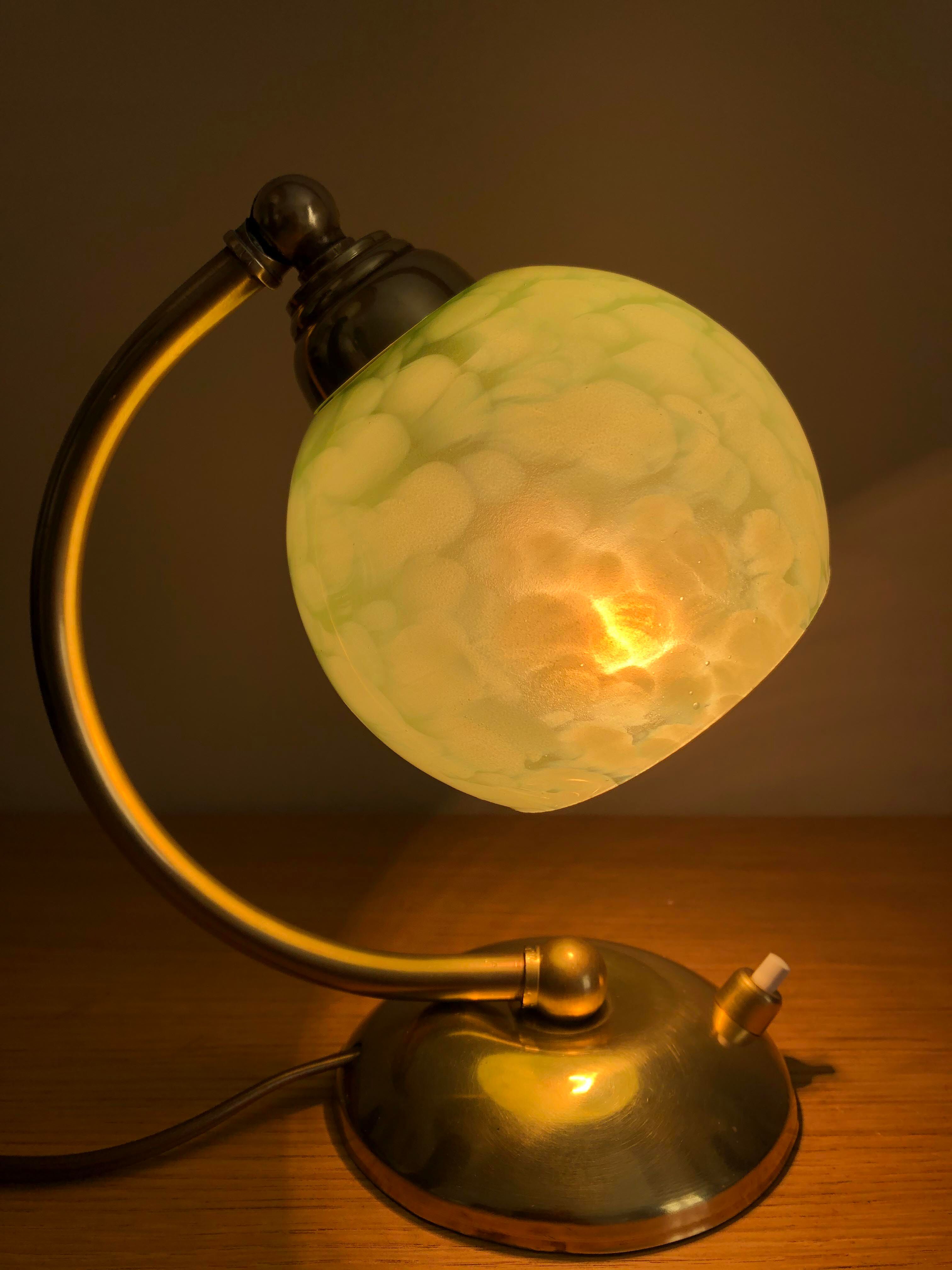 Old articulated bedside lamp