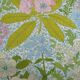Nappe ronde à décor de fleurs vers 1970