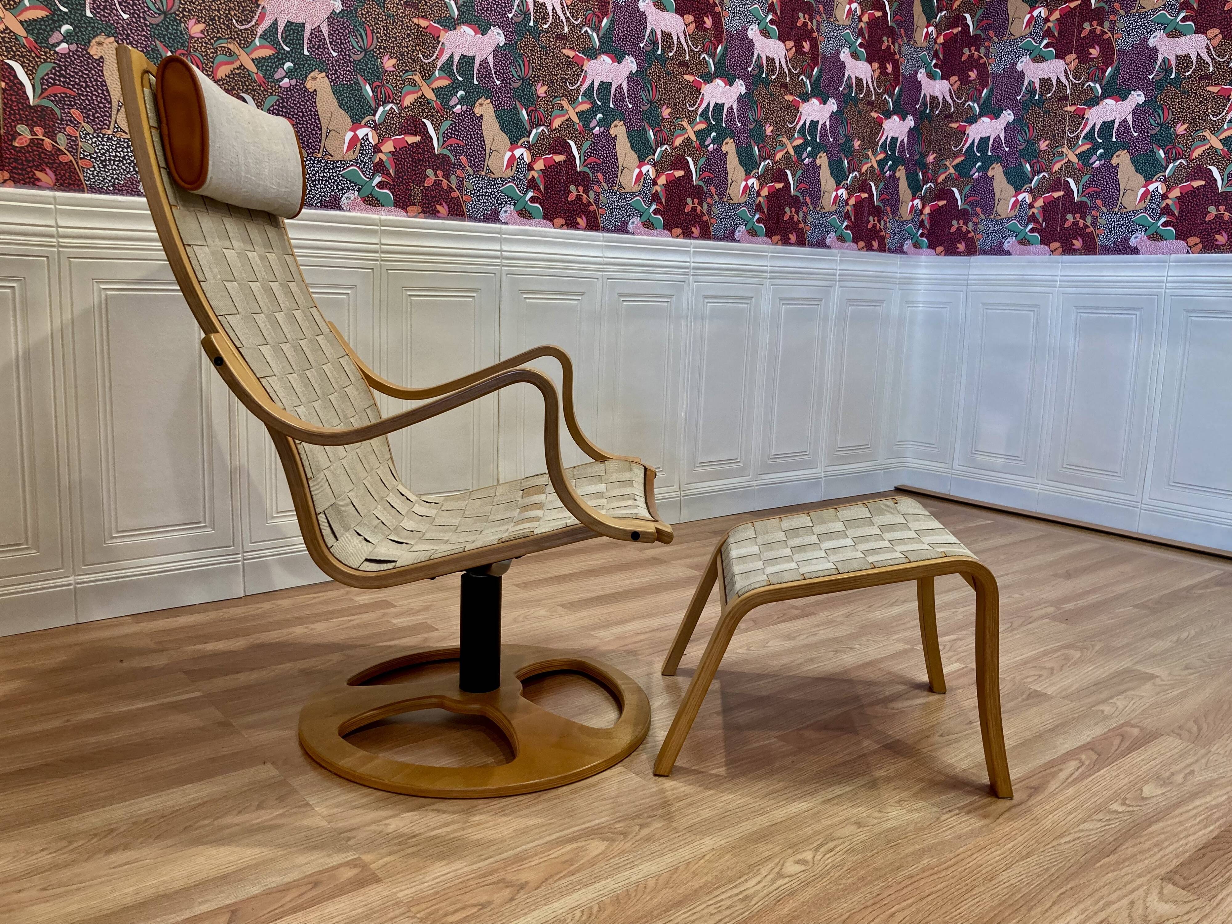 Swivel armchair and its ottoman in 1960s Scandinavian design.