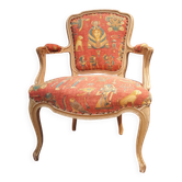 Louis XV style armchair upholstered with an Egyptian pattern.