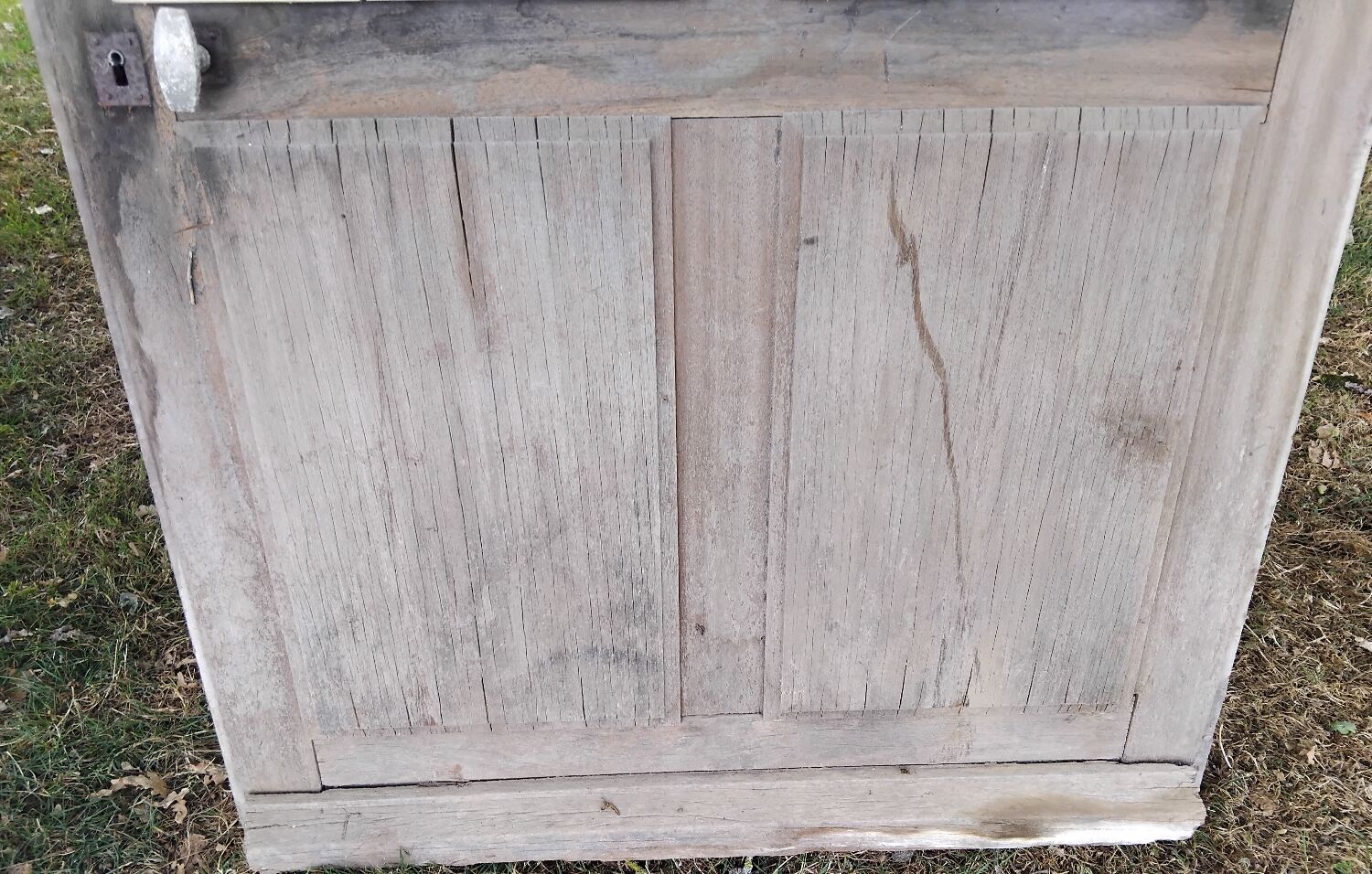 Old door with vintage wooden shutters