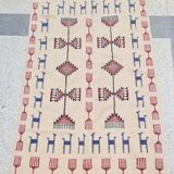 Tapis kilim beige à motifs multicolores fait main en pure laine