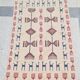 Tapis kilim beige à motifs multicolores fait main en pure laine