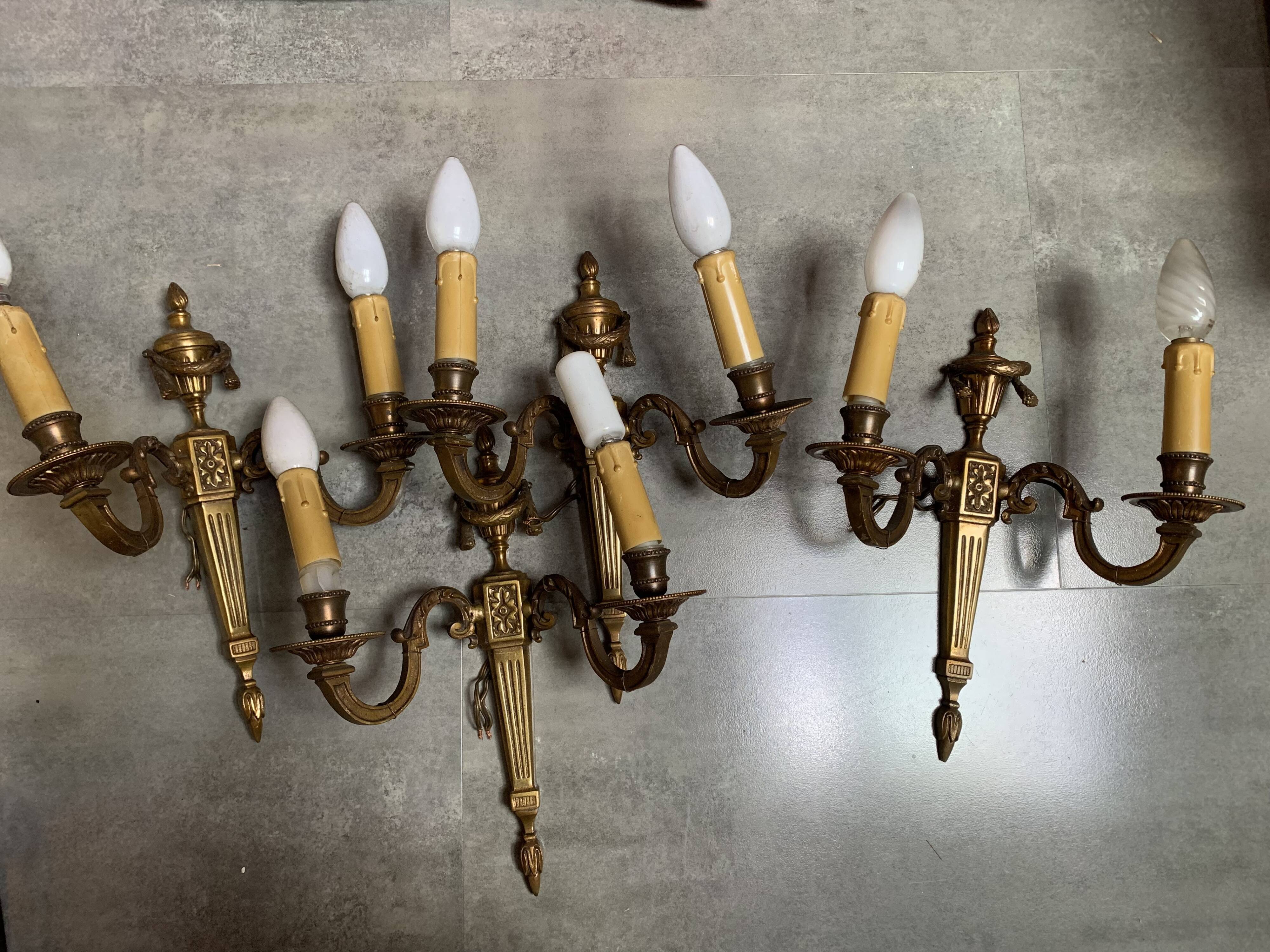 Double brass sconces