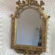 Baroque style mirror, decorated with shells and flowers.