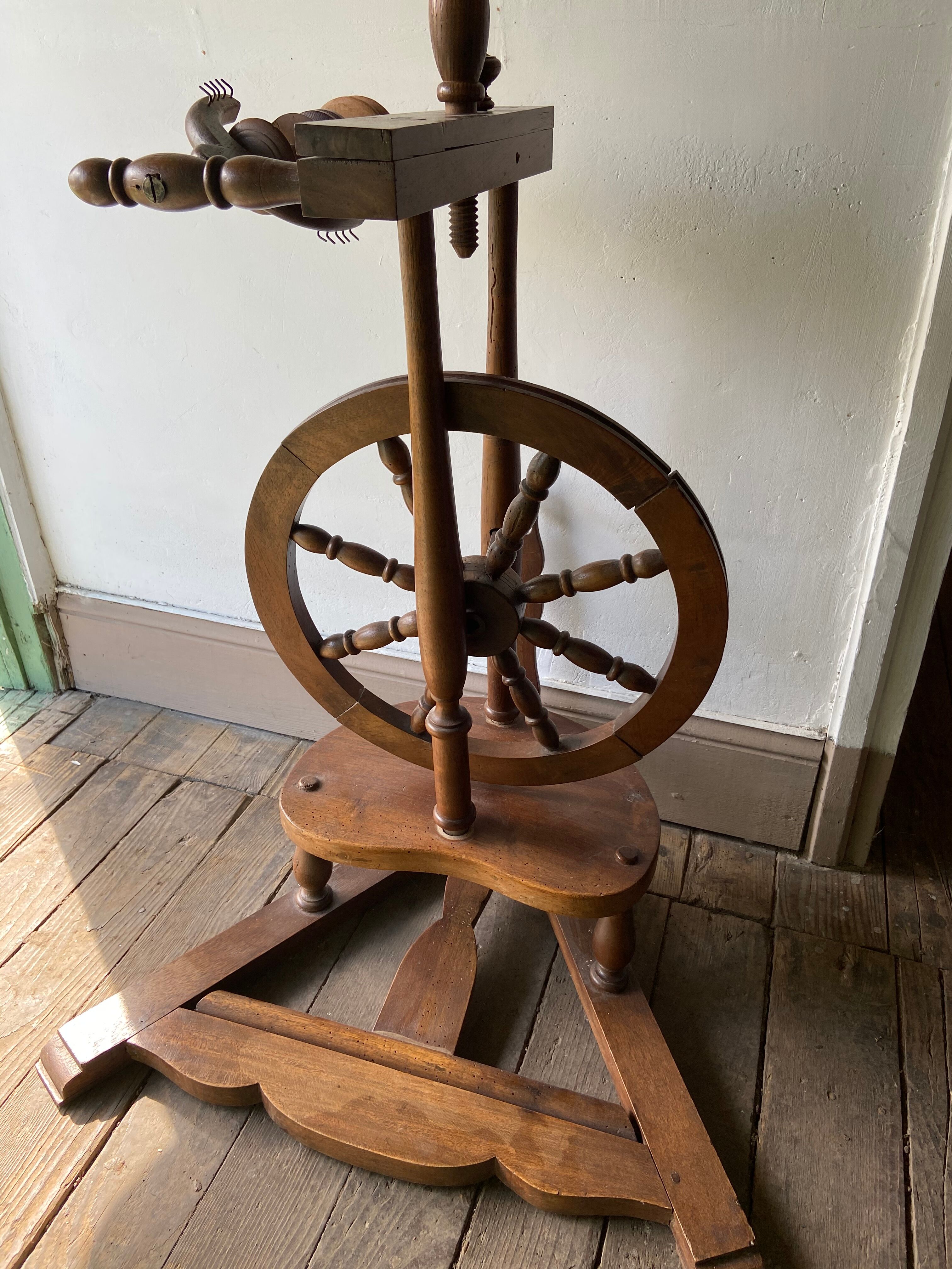 Wooden spinning wheel