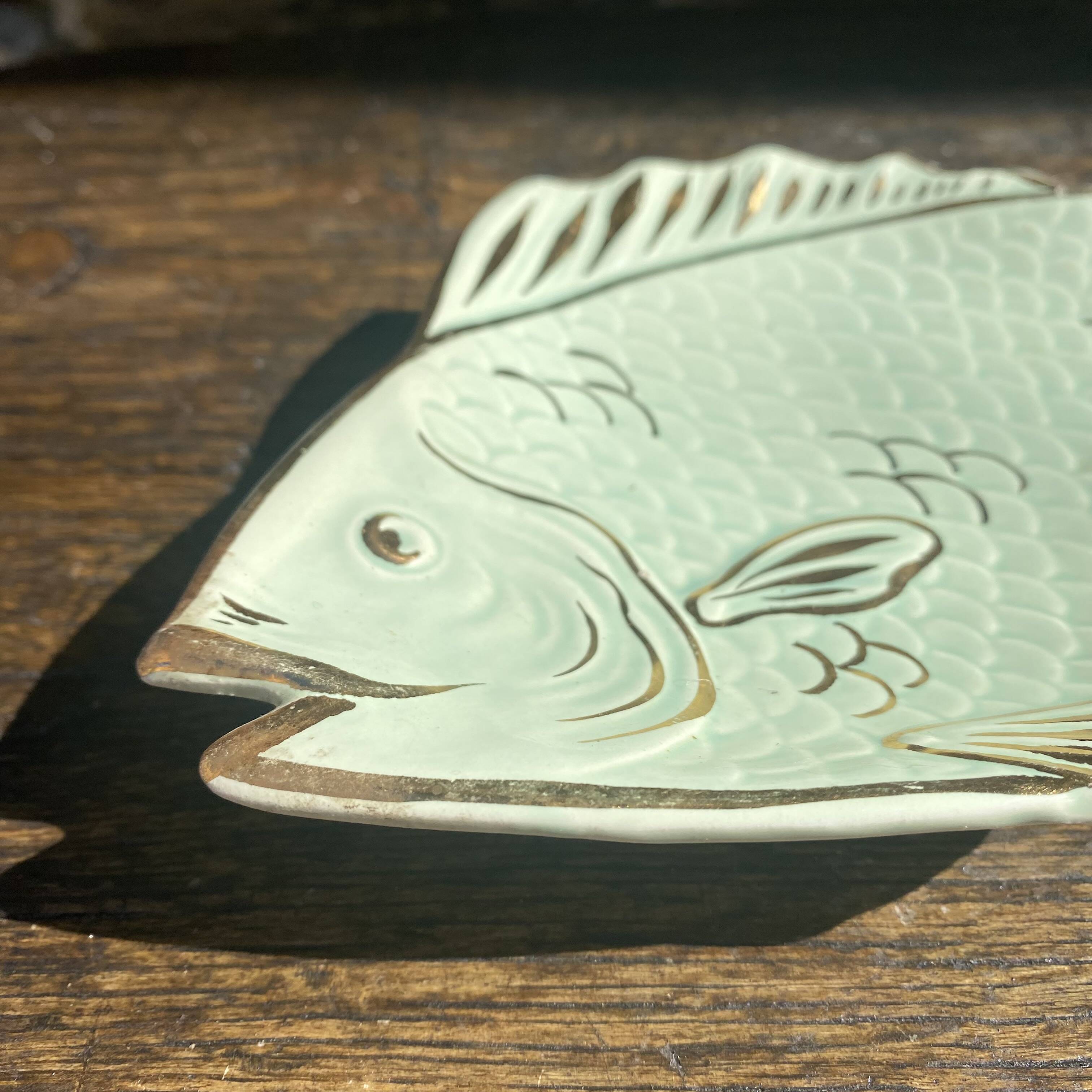 Small fish dish, pocket emptier.