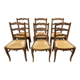 8 vintage rustic mulched chairs