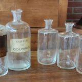 Series of 5 blown glass apothecary pharmacy bottles