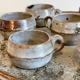 Enamelled stoneware tray and its 7 cups