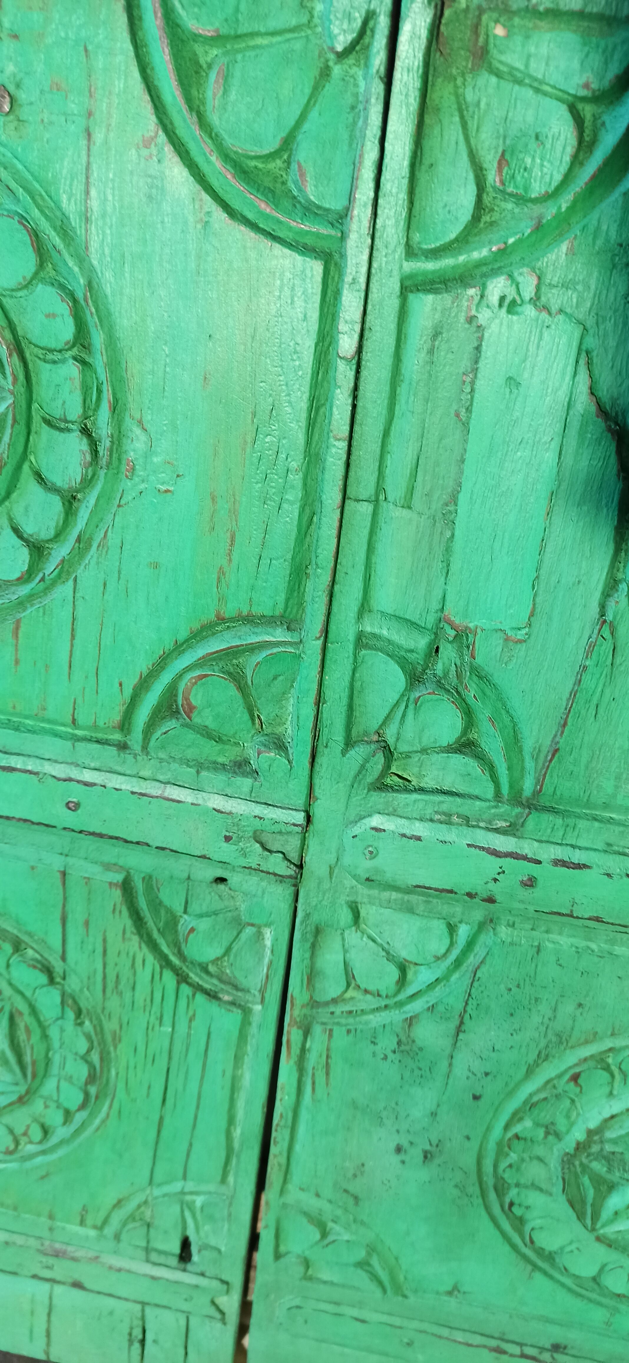 Old green wooden door