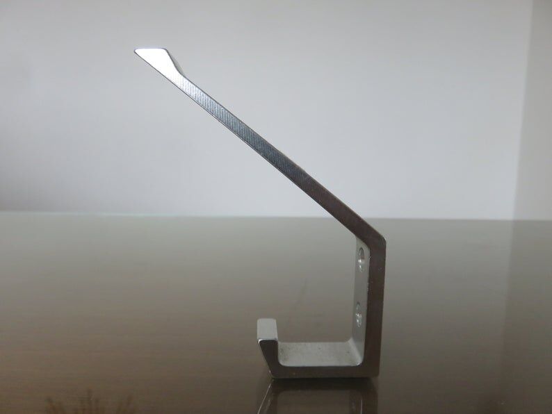 Series of 16 70s aluminium pads