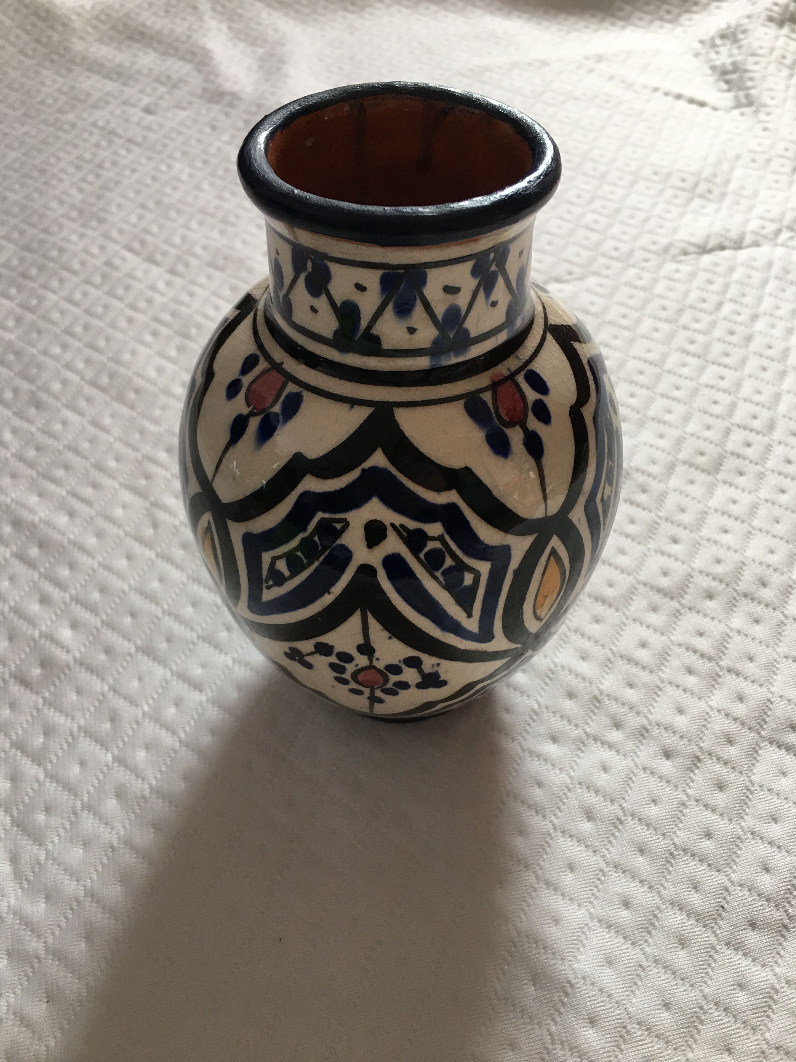 small ceramic vase