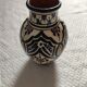 small ceramic vase