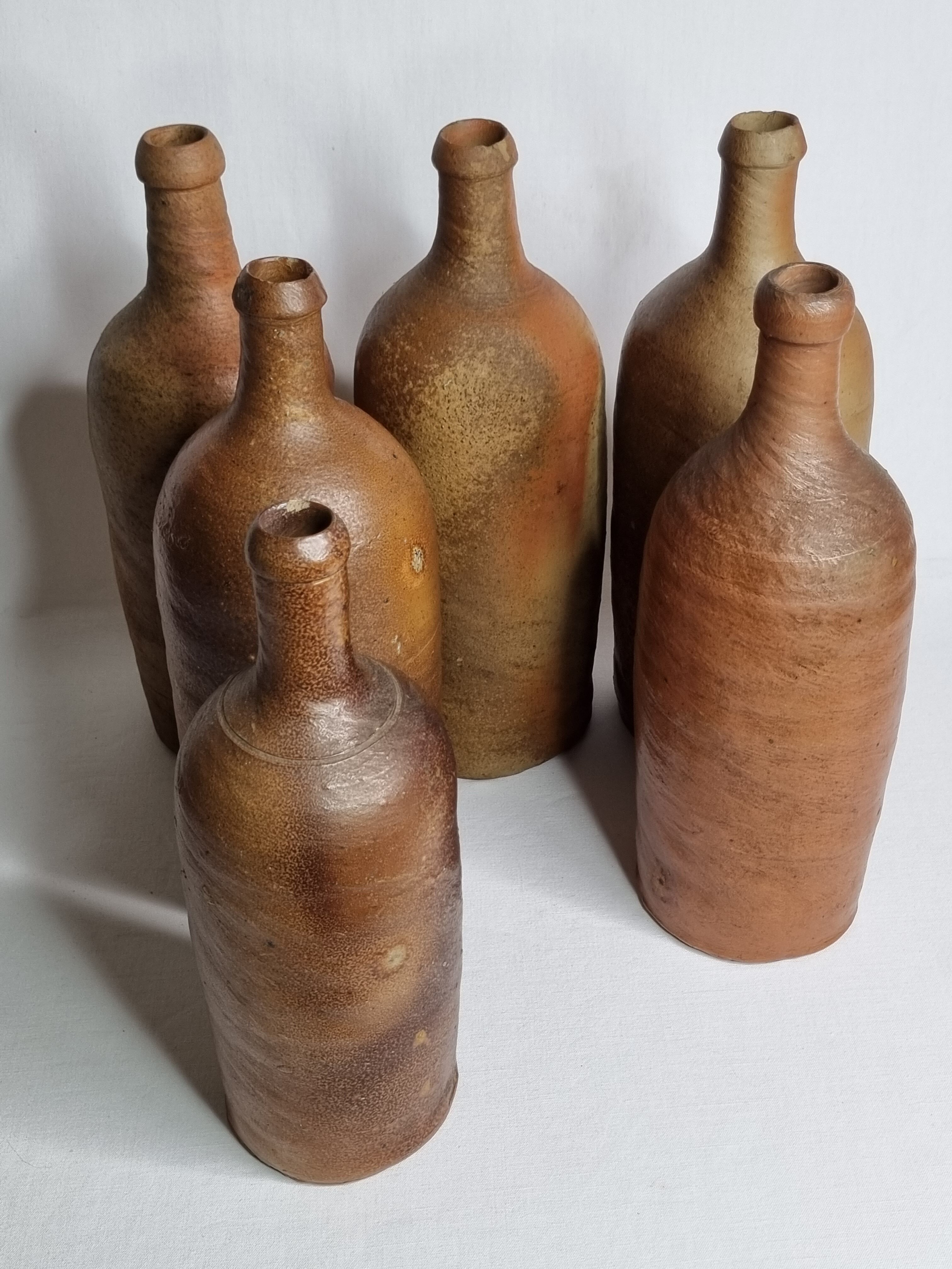 Set of 6 hand-turned stoneware bottles, 31 cm