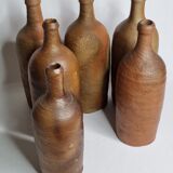 Set of 6 hand-turned stoneware bottles, 31 cm