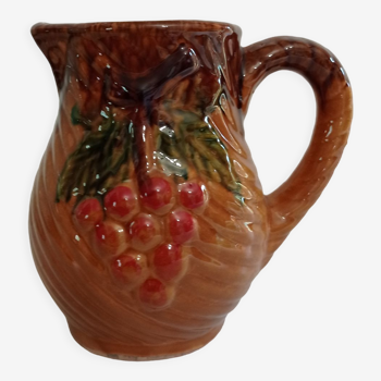 Pitcher in slip decorated with grapes