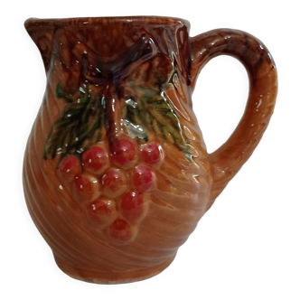 Pitcher in slip decorated with grapes