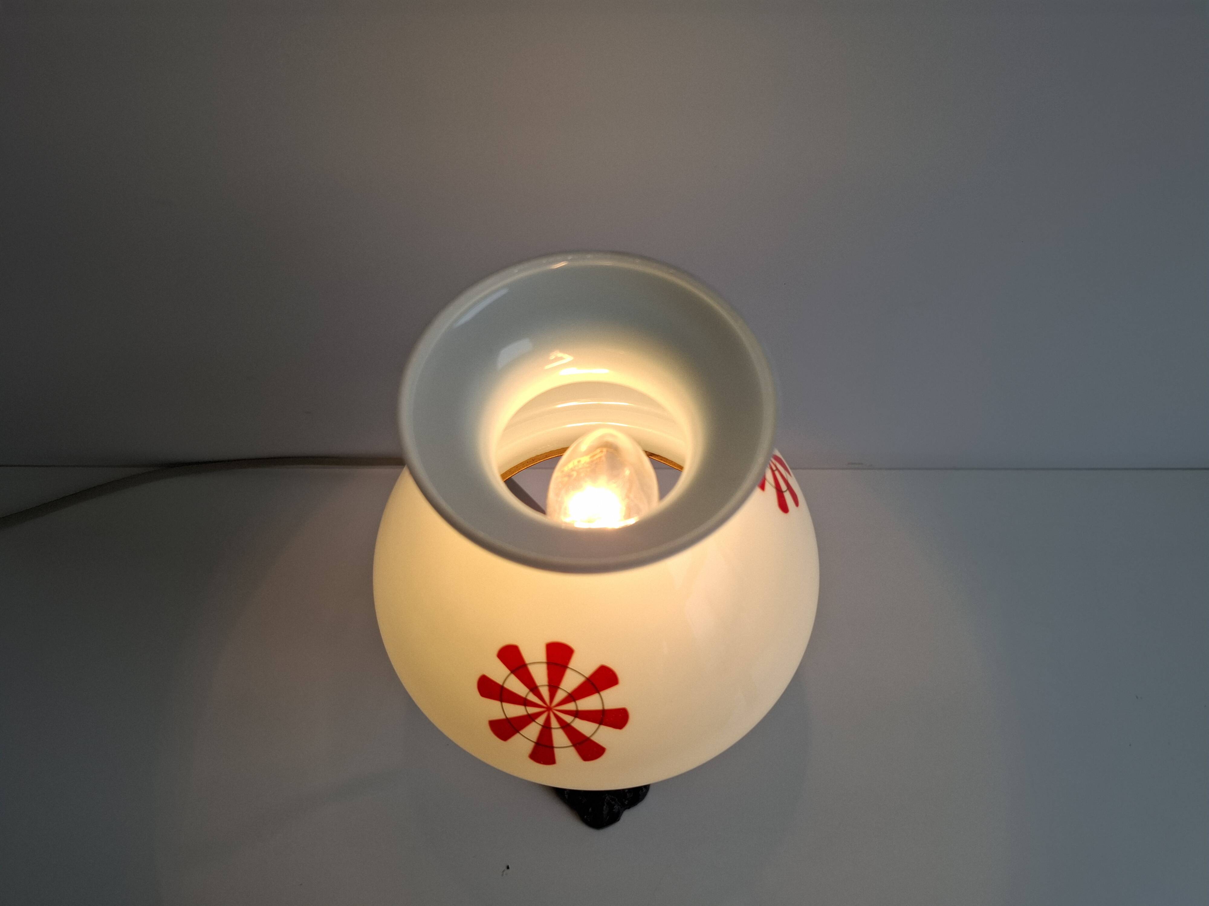 1960s Czechoslovakian milk glass oil lamp style table lamp with red windmill