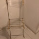Folding chair in plexiglass and brass
