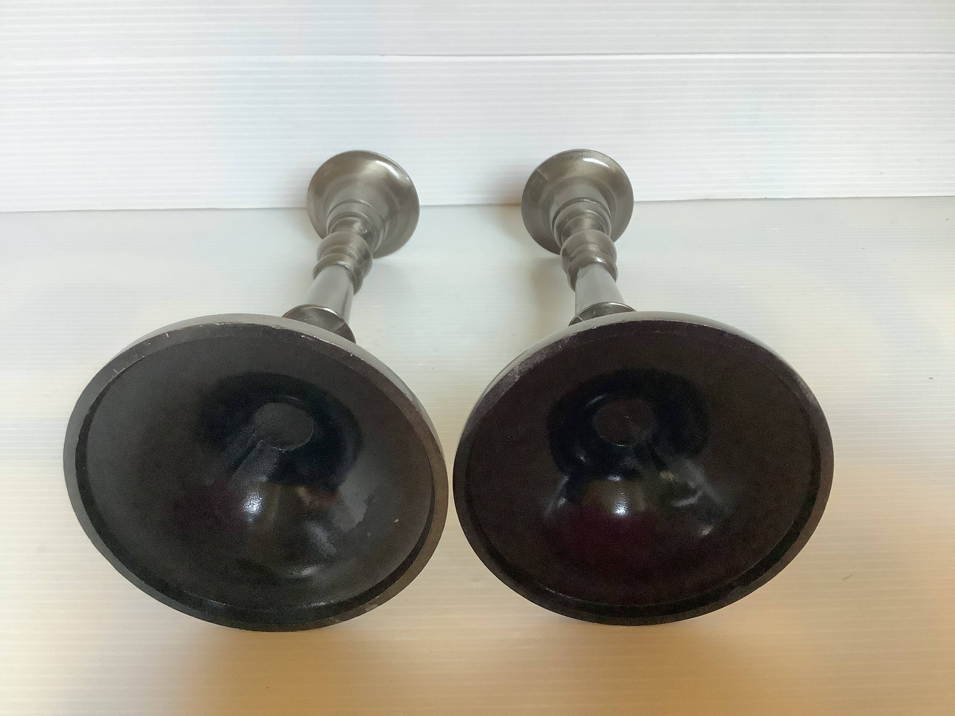 Pair of metal candlesticks