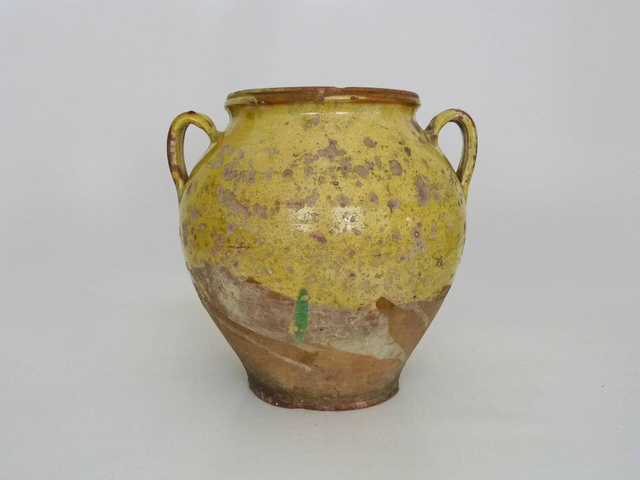 Magnificent glazed yellow confit pot, south-west of France. 19th century.