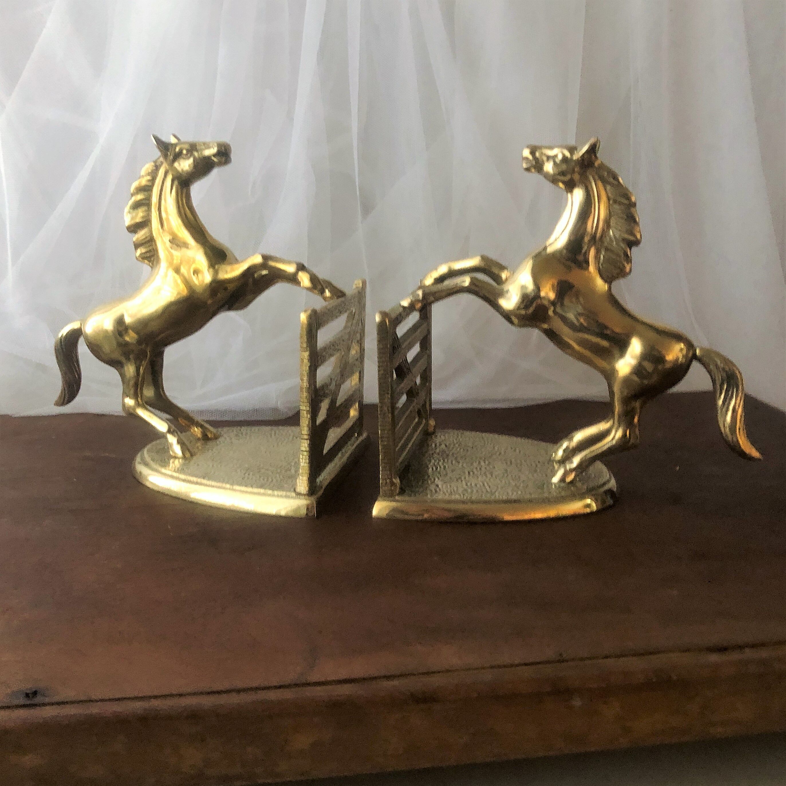 Goldeneye brass décor horses